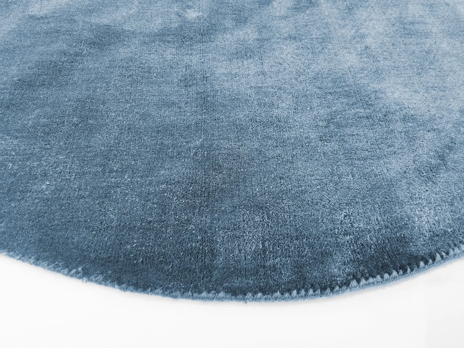 Rundt teppe - Recycled PET with viscose look (blå)