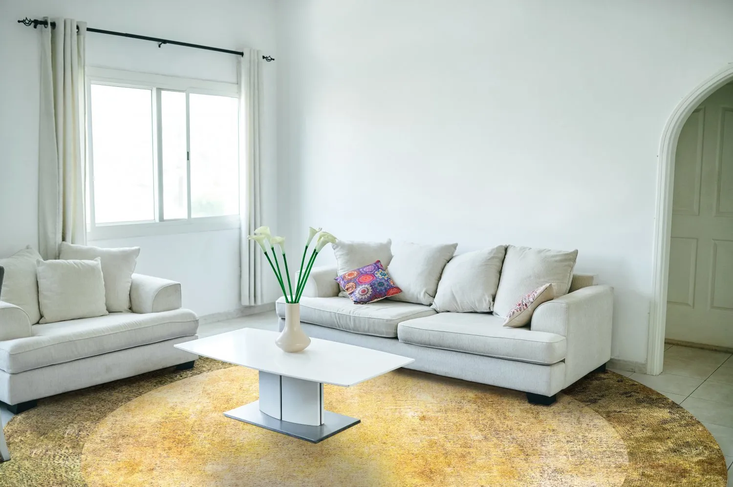 Rundt teppe - Campana (beige/gul)