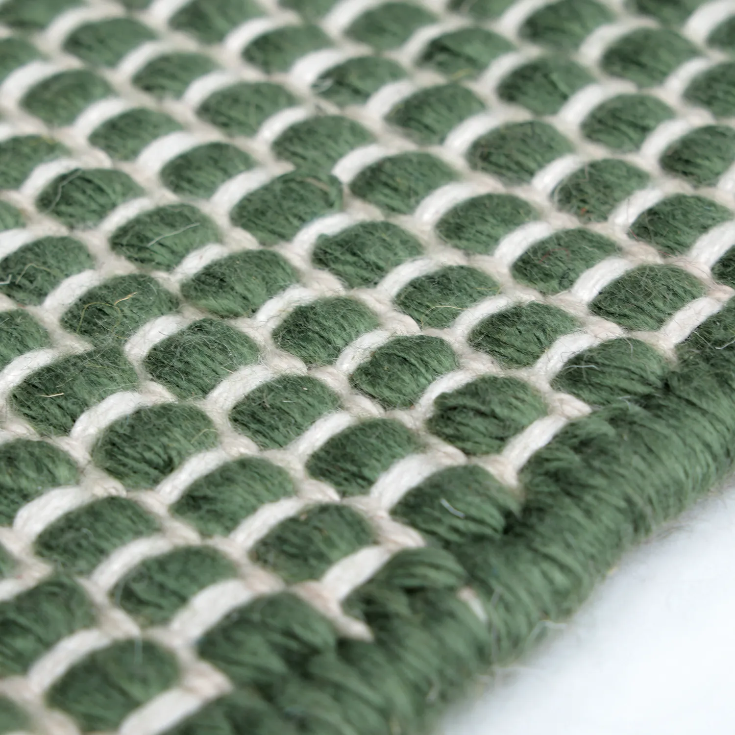 Innendørs/Utendørs tepper - Coastal Wool Look (grønn/hvit)
