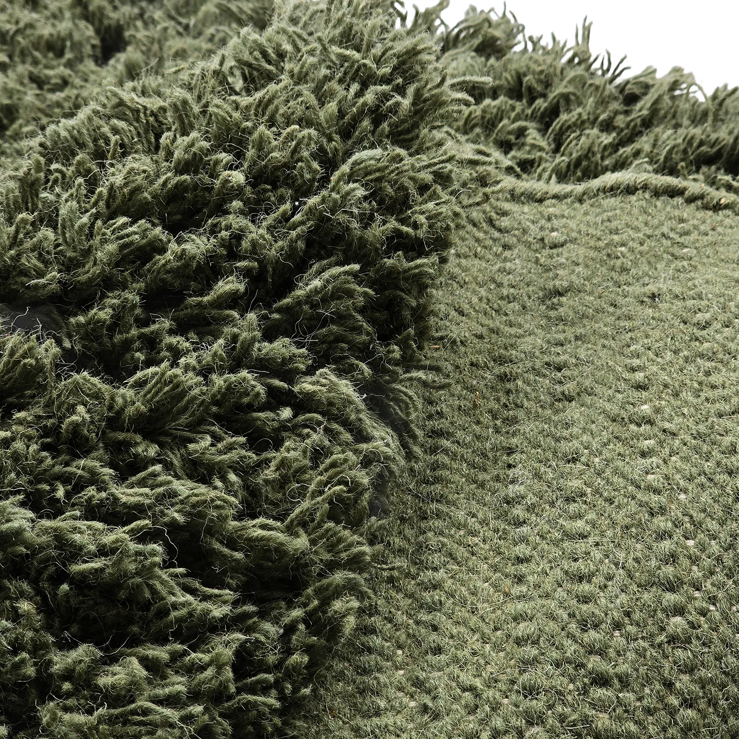 Rundt teppe - Fassale Hand Woven Wool Shaggy (mosegrønn)