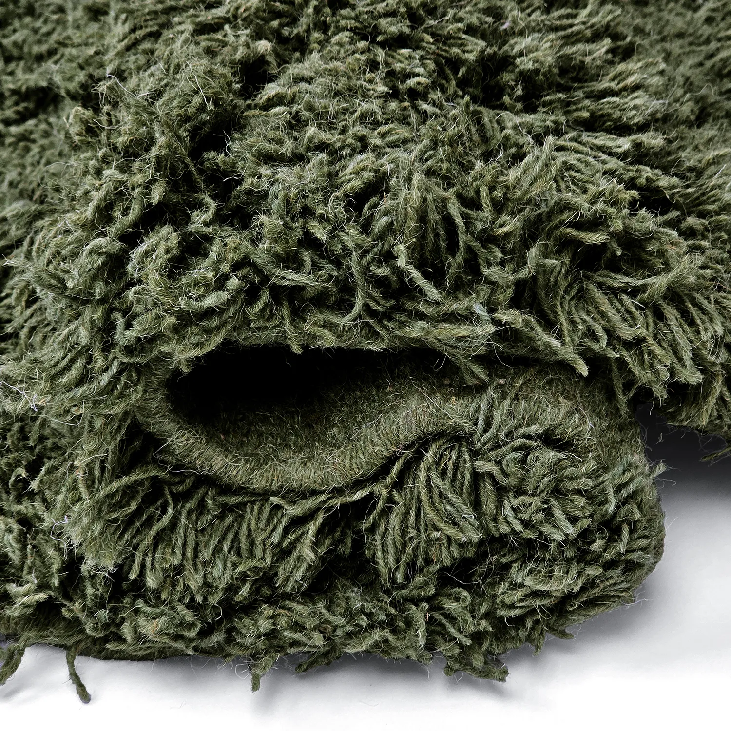 Rundt teppe - Fassale Hand Woven Wool Shaggy (mosegrønn)