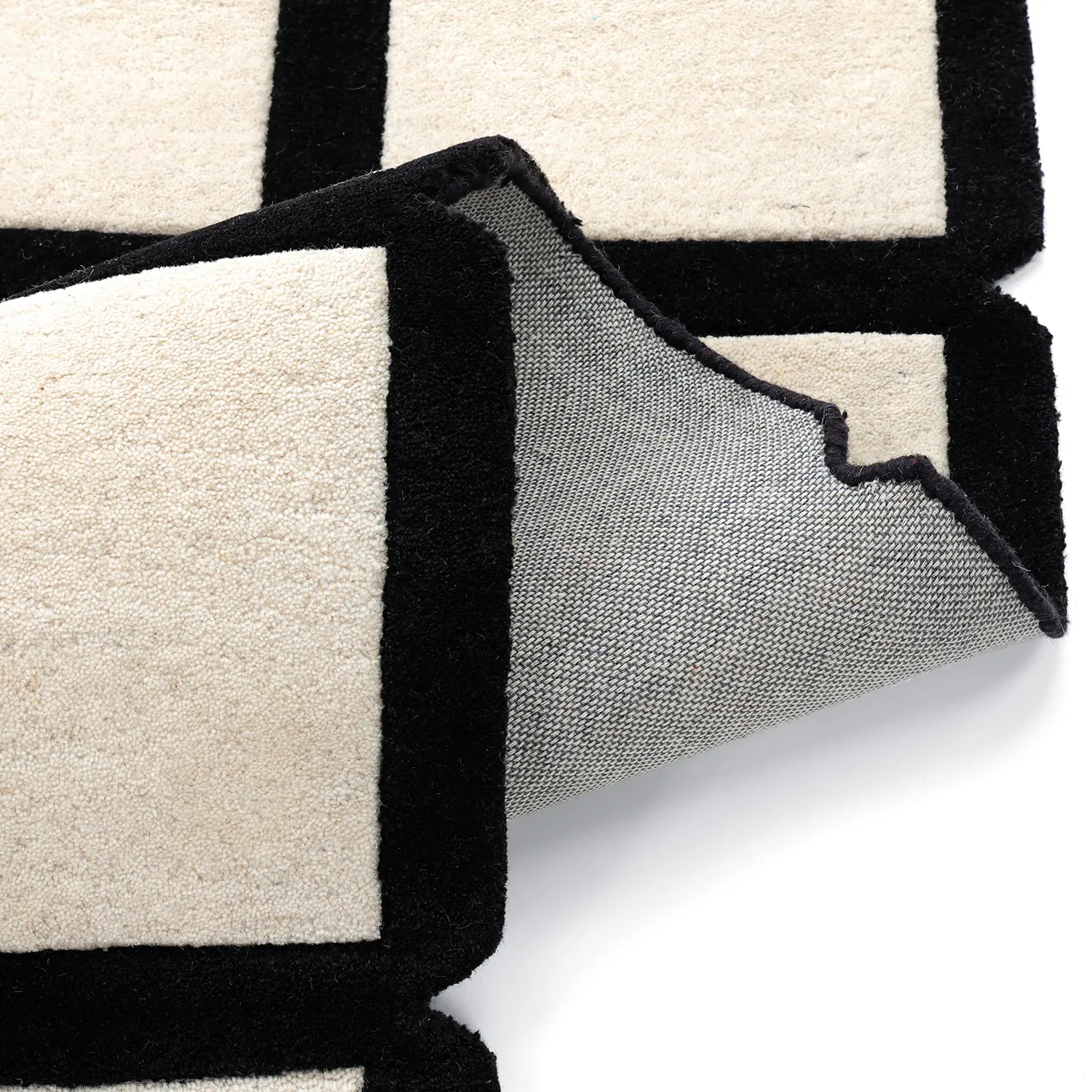 Ullteppe - Syl Hand Tufted Wool Premium (svart/hvitt)